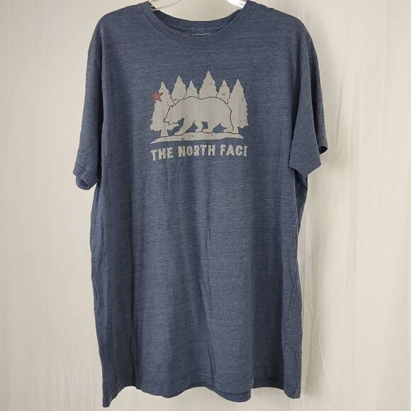 Men's XXL The North Face Slim Fit California Bear t-shirt Heathered Blue.
Armpit - Picture 1 of 4